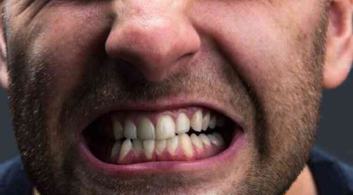 Чому люди скриплять зубами уві сні і що з цим робити?